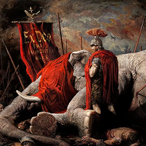 Roman soldier stands beside a fallen war elephant on a battlefield.