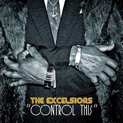 "Black and white vinyl album cover featuring a man in a suit and fur coat."