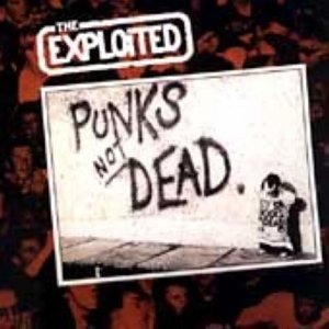 Album cover for The Exploited Punks Not Dead featuring graffiti text on a wall.