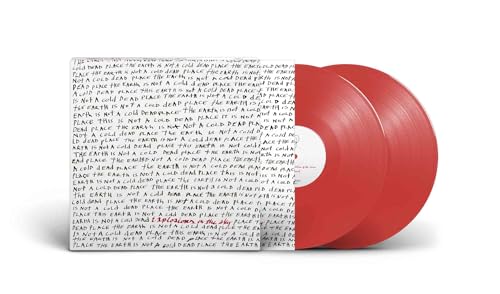 Vinyl record cover with handwritten text and two red vinyl discs.