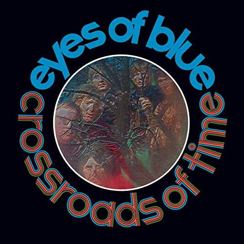 Album cover featuring a circular photo of a band behind branches, surrounded by text.