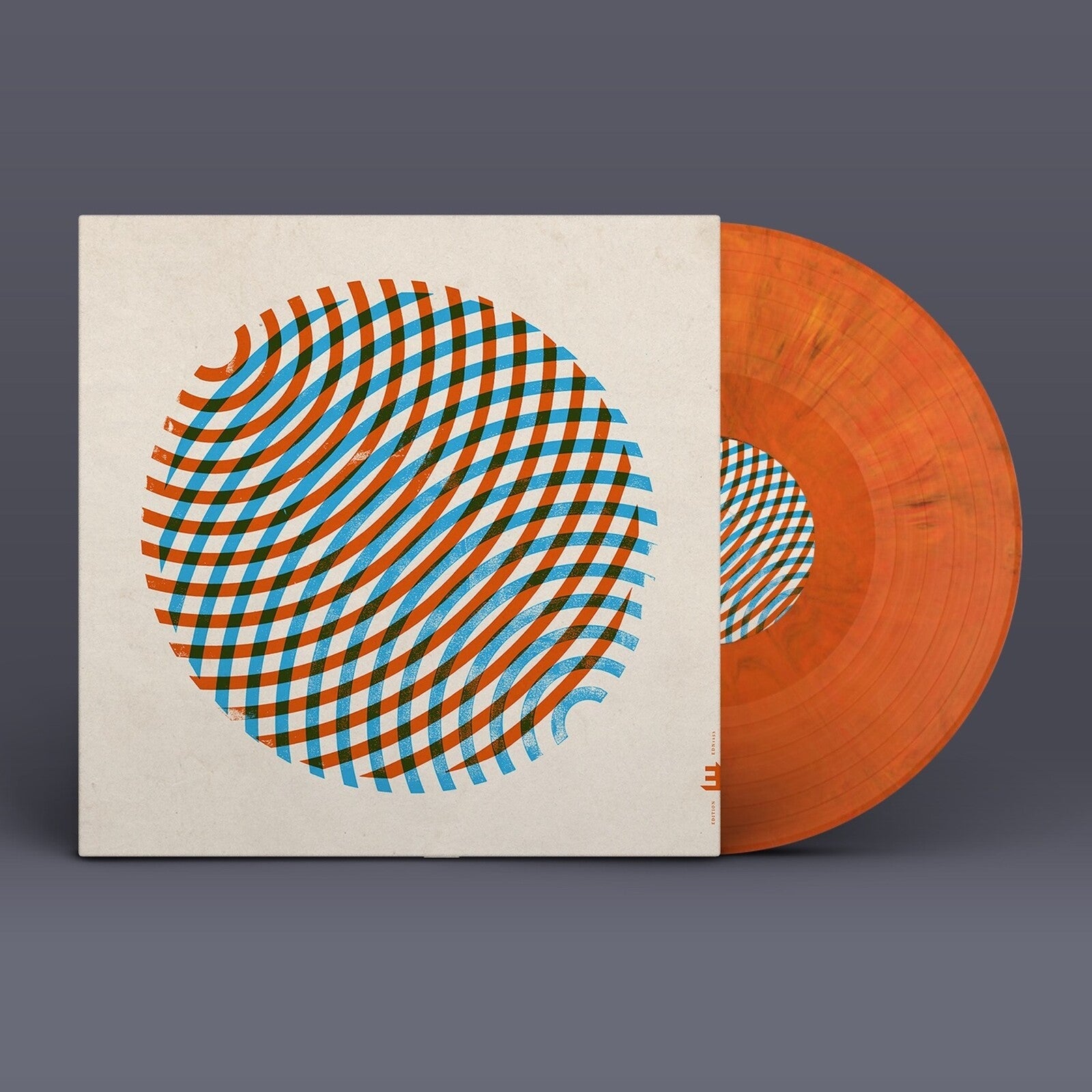 Vinyl record with abstract orange and blue striped cover art.