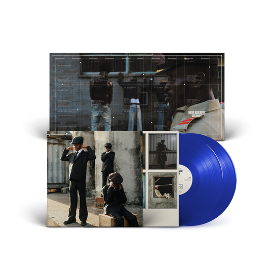 Blue vinyl LP with album cover featuring musicians in suits.