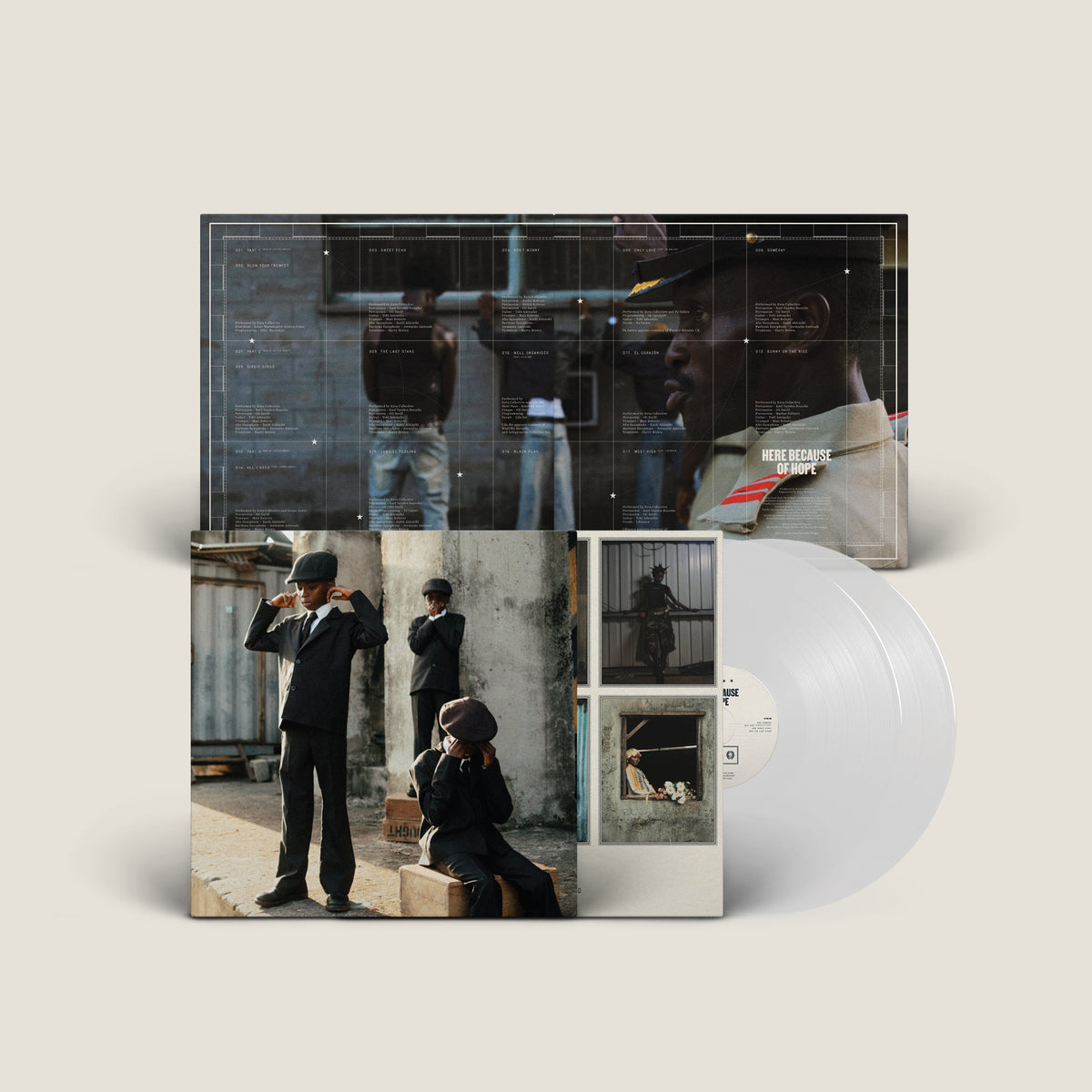 White vinyl LP of Ezra Collective’s “Here Because of Hope” with cover art.