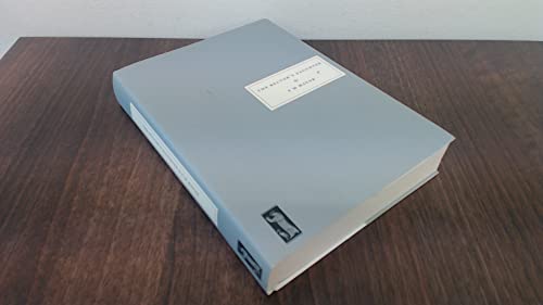 Pale blue book, “The Rector’s Daughter,” lying on a wooden surface.