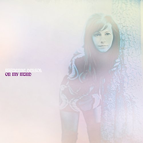 Fabienne Delsol album cover, portrait of a woman with long hair.