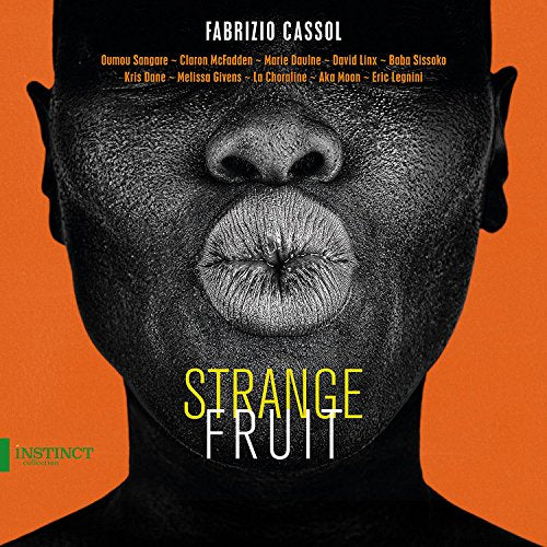 "Album cover with a black man's face and 'Strange Fruit' text on orange background."