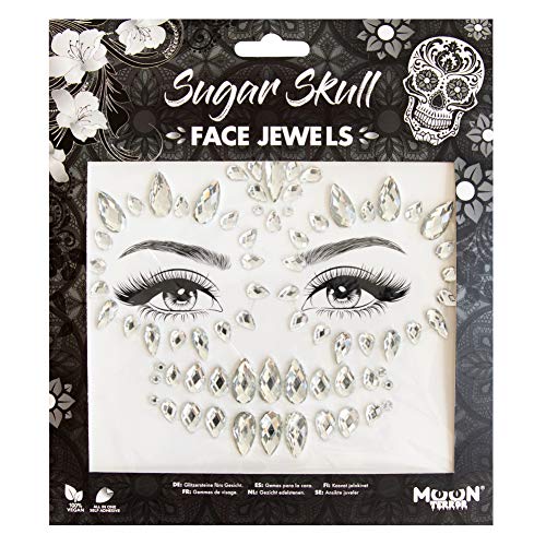 Clear adhesive face gems arranged in a sugar skull pattern on a backing card.