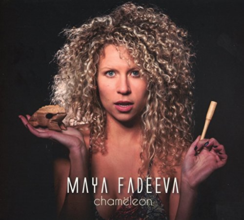 CD cover: woman with curly hair holding a small chameleon.