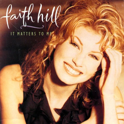Faith Hill album cover, featuring a portrait of the singer smiling.