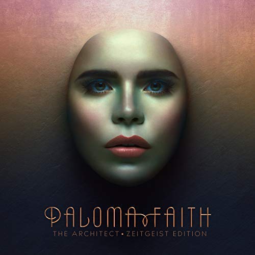 "Album cover featuring a bald woman's face with blue eyes and pink lips."