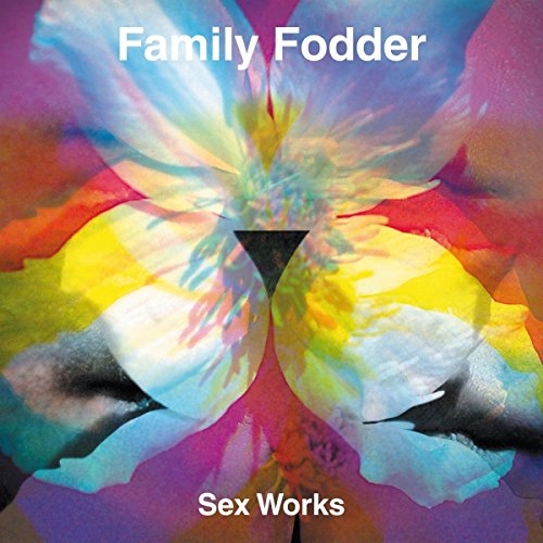 The image shows a vinyl record cover with a symmetrical, abstract floral design. Alt text: "Vinyl record cover with abstract, mirrored flower design and white text."