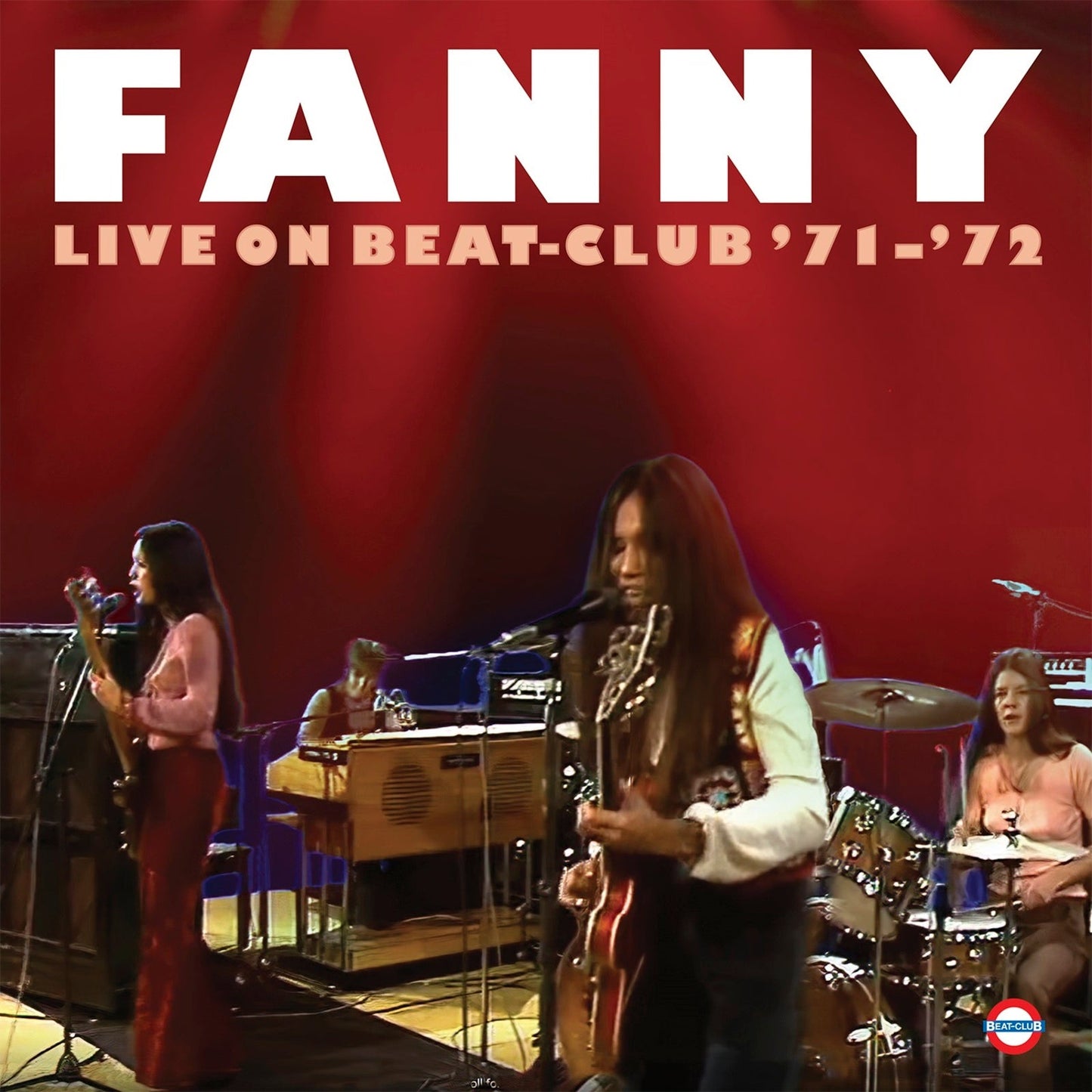 Fanny band performing live on stage, album cover with peach vinyl indication.
