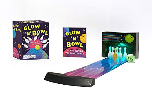 Glow-in-the-dark miniature bowling set with pins, ball, and lane.