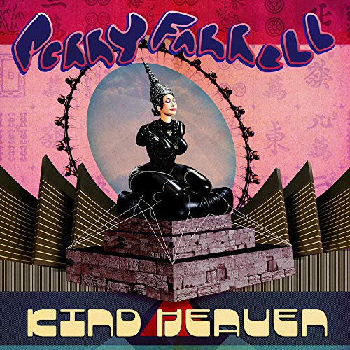 Vinyl album cover featuring a person in black kneeling on a brick structure.