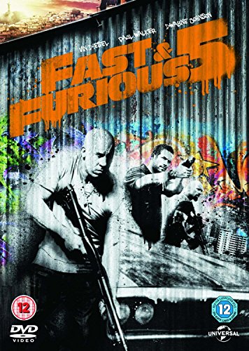 "Fast Five DVD cover featuring men with guns in front of a graffiti wall."