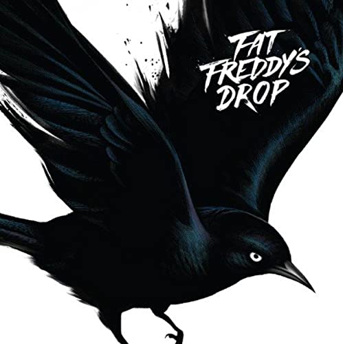 CD cover: blackbird with spread wings and white eye, dark background.