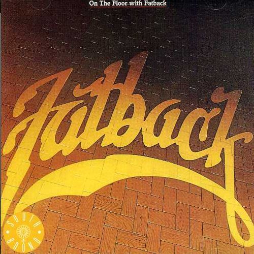 "Album cover with 'Fatback' in yellow script on a wooden floor background."