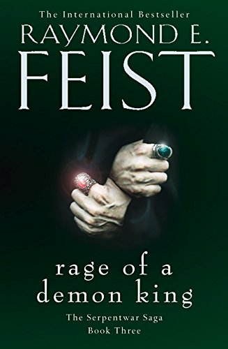 Book cover: dark green background, hands with jeweled rings, title text.