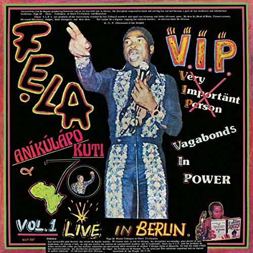 Fela Kuti album cover featuring a man in a patterned suit holding a microphone.