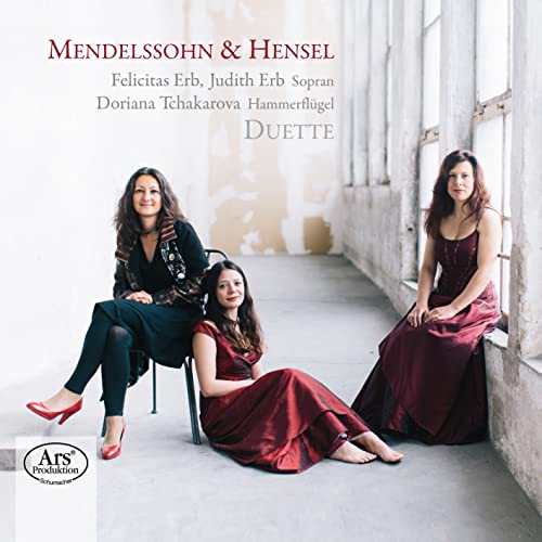 CD cover featuring three women, two singers and a pianist.
