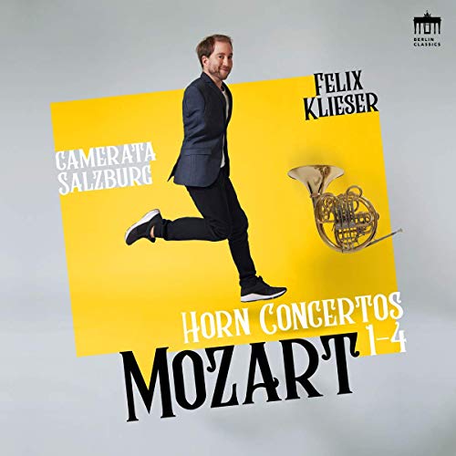 CD cover: Musician with a French horn on a yellow background.