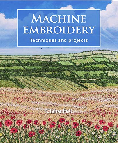 Book cover showing a machine-embroidered landscape with poppies, wheat fields, and green hills.