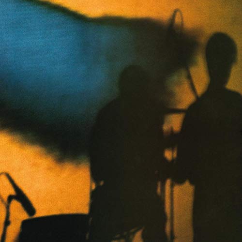 Silhouettes of two musicians playing instruments on stage, orange and blue background.