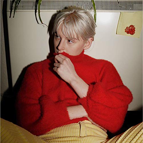 Fenne Lily album cover: woman in red sweater, looking thoughtfully.