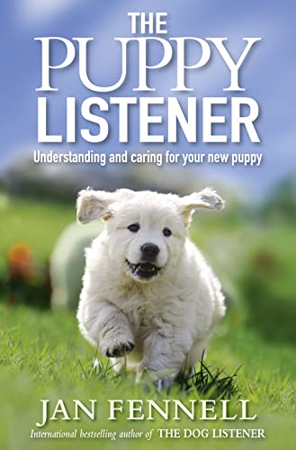 Book cover featuring a fluffy white puppy running through green grass.
