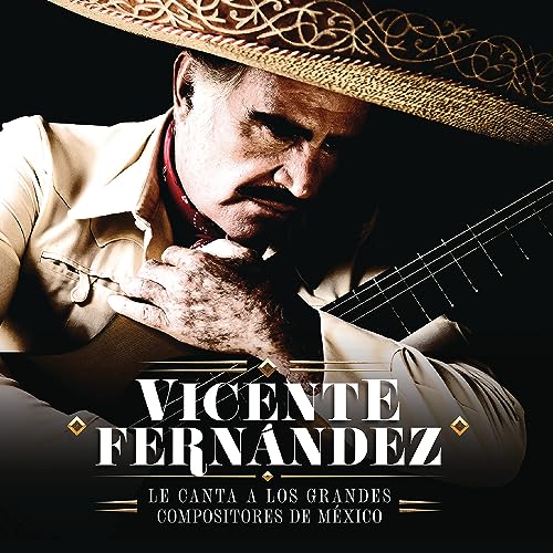 Vicente Fernández in a straw hat holding a guitar, album cover.