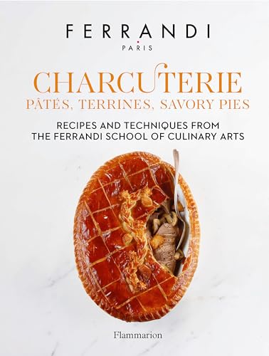 Cookbook cover featuring a cross-section of a savory meat pie.