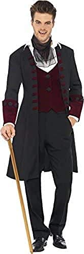 Man in a dark gothic vampire costume with red accents.