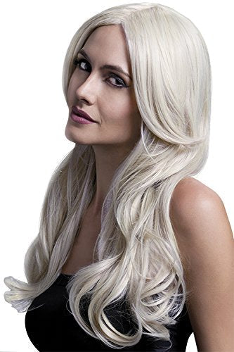 Woman wearing a long, wavy blonde wig with side-swept bangs.