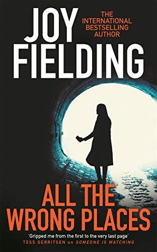 Book cover: woman in tunnel, text "All The Wrong Places" by Joy Fielding.