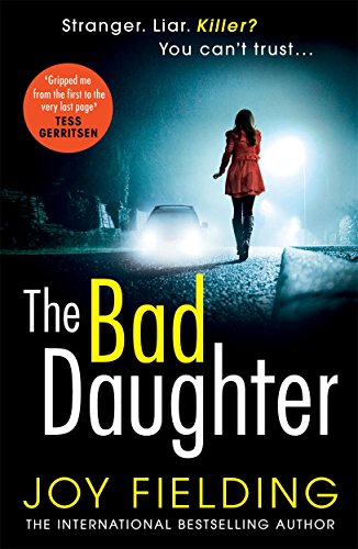 Book cover: woman walking towards headlights on a dark road.