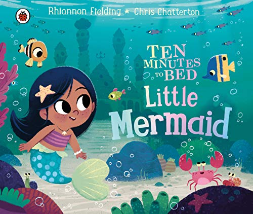 A cartoon mermaid with dark hair swims underwater surrounded by fish, coral, and a crab.