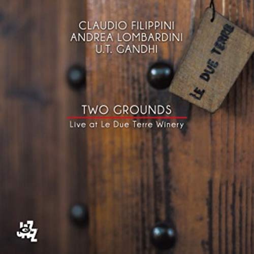 CD cover for "Two Grounds" by Claudio Filippini, featuring woodgrain texture.