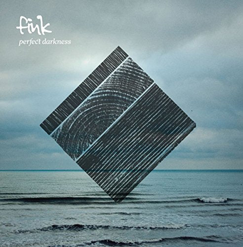 Album cover for Fink’s “Perfect Darkness” featuring a tilted, textured cube over water.