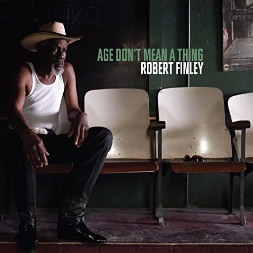 Robert Finley album cover: man in hat seated in front of chairs.
