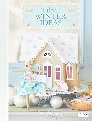 Book cover featuring a gingerbread house, doll, and winter decorations.