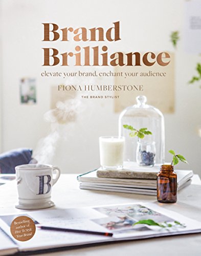 Book cover with title "Brand Brilliance" and still life arrangement.