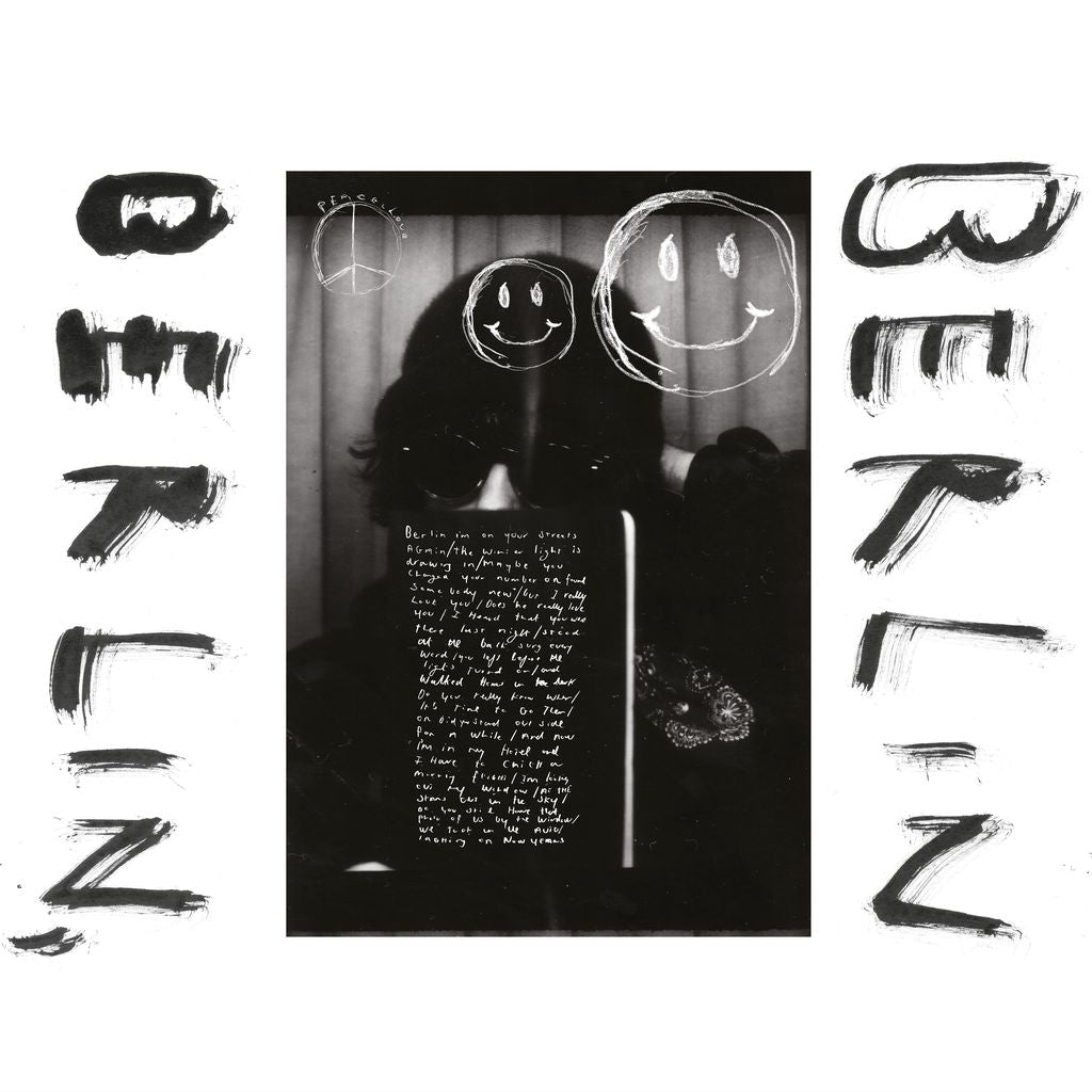 CD cover for Fionn Regan’s “Berlin, Berlin” with sketched faces and text.