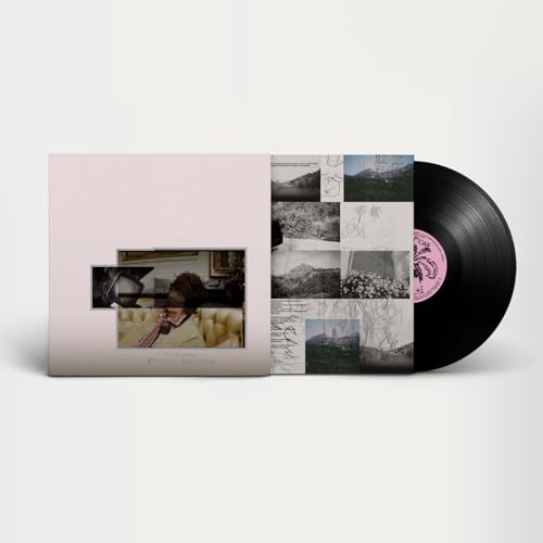 Vinyl record and album cover with collage of black and white photos.
