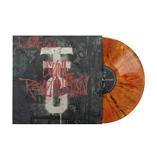 Vinyl record with abstract black and red cover, orange swirl pattern.