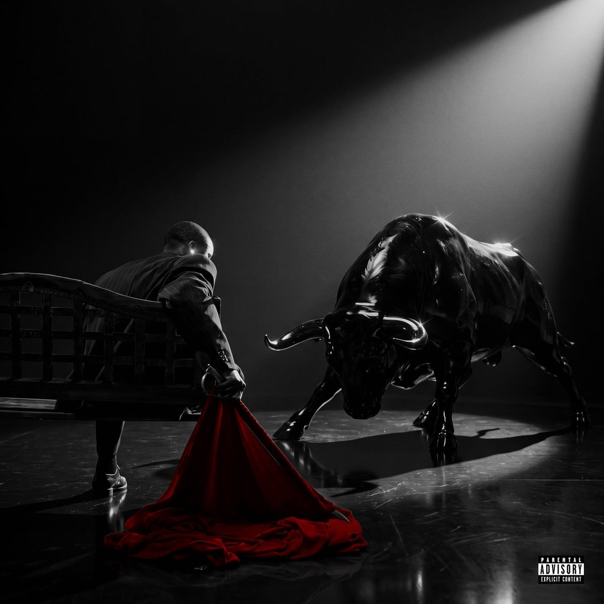 Black and white album cover featuring a man and charging bull.
