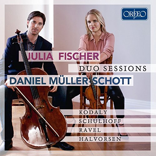 "CD cover featuring a man and woman holding cellos, with text overlay."