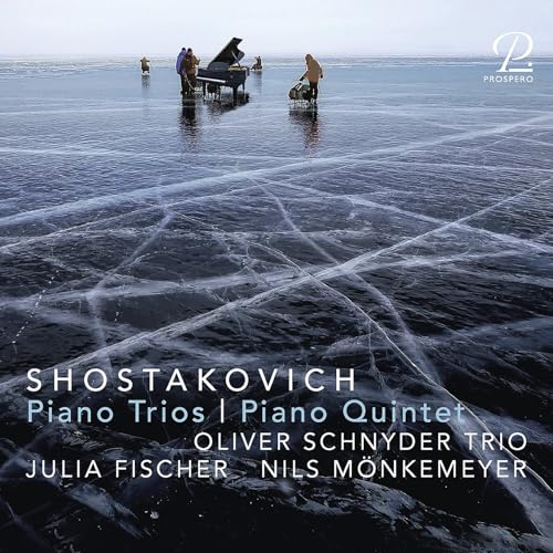 CD cover: piano and musicians on a cracked, icy landscape.