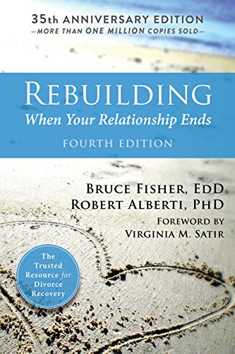 Book cover: "Rebuilding," 4th edition, with beach and handwritten heart drawing.