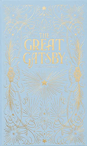 Gold-foiled cover of “The Great Gatsby” with art deco flourishes.